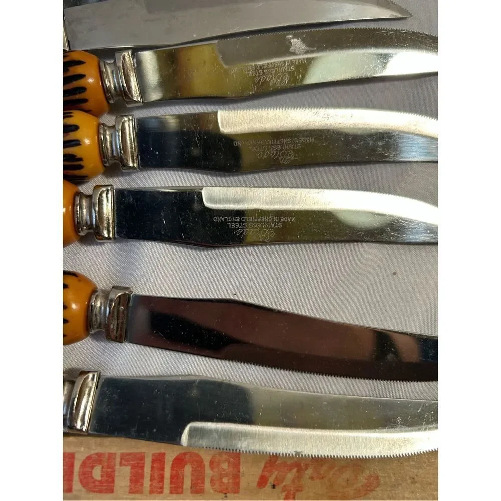 8 Blade Sheffield serrated knives‎ vintage replacements faux horn handle